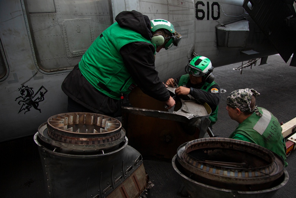 Sailors conduct routine maintenance aboard Abraham Lincoln