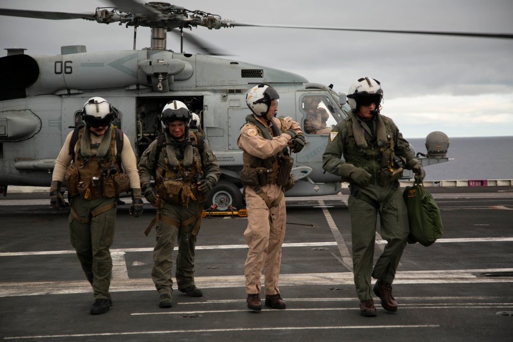 Capt. Pete Riebe participates in helicopter operations aboard Abraham Lincoln