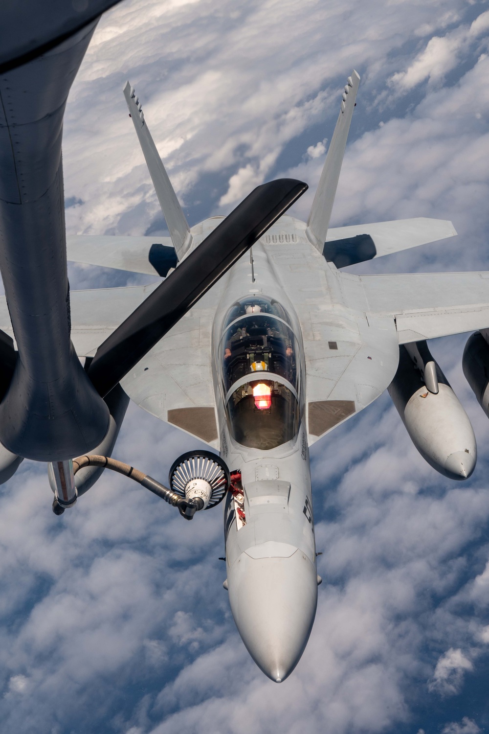 KC-135 refuels FA-18F during RIMPAC 2024