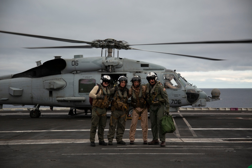 Capt. Pete Riebe participates in helicopter operations aboard Abraham Lincoln