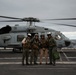 Capt. Pete Riebe participates in helicopter operations aboard Abraham Lincoln