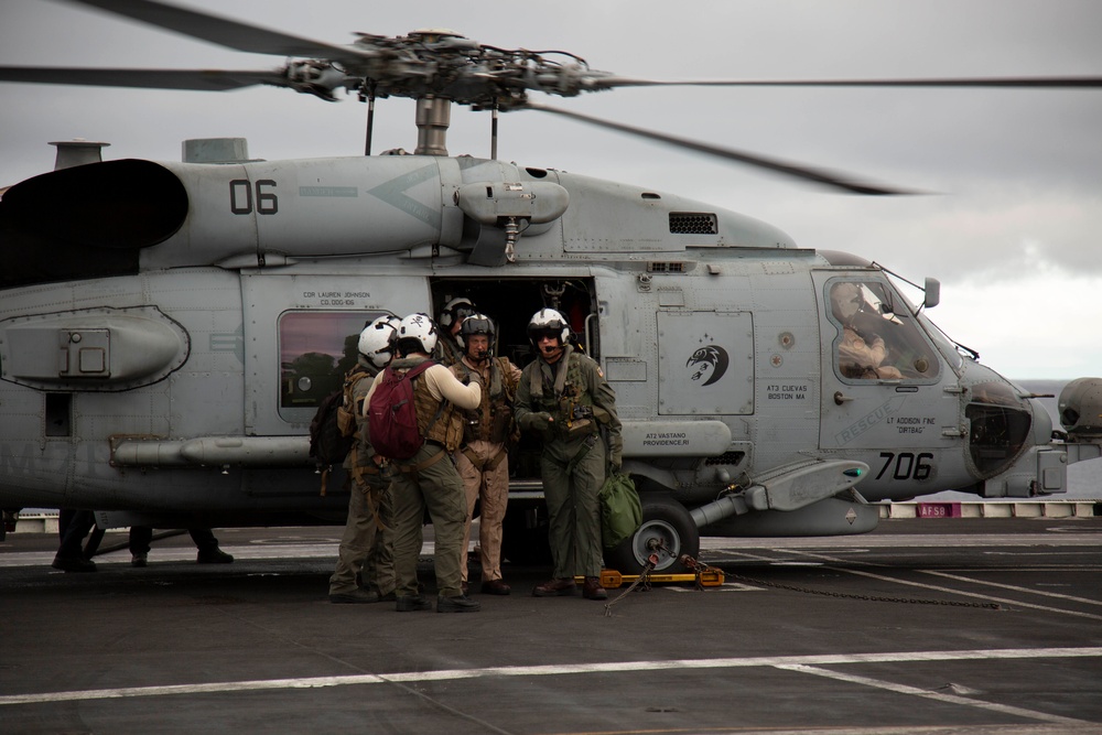 Capt. Pete Riebe participates in helicopter operations aboard Abraham Lincoln