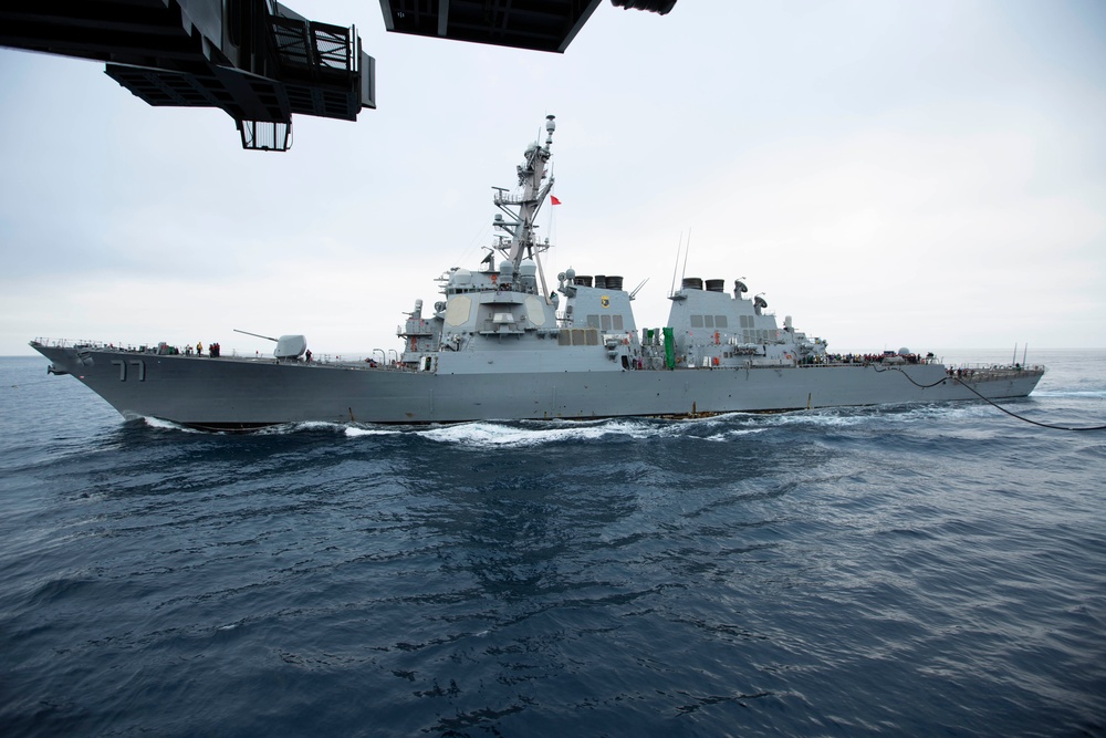 Abraham Lincoln conducts a fueling-at-sea with USS O’Kane