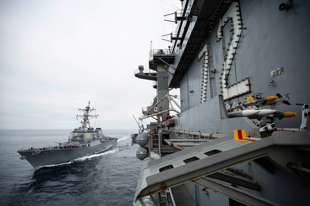 Abraham Lincoln conducts a fueling-at-sea with USS O’Kane