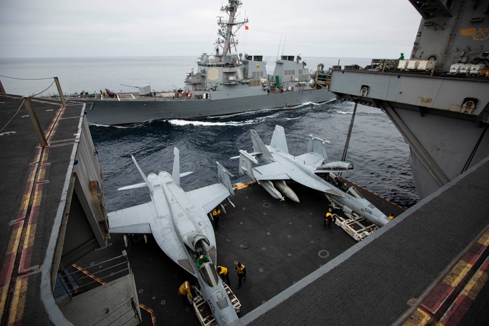 Abraham Lincoln conducts a fueling-at-sea with USS O’Kane