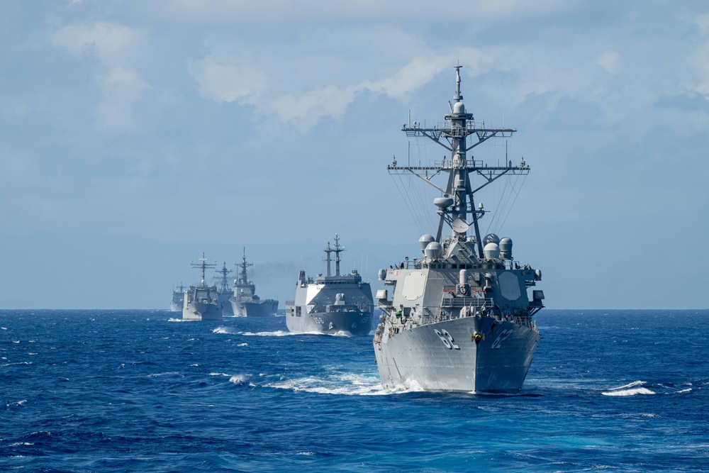 Multinational ships sail in formation during RIMPAC 2024