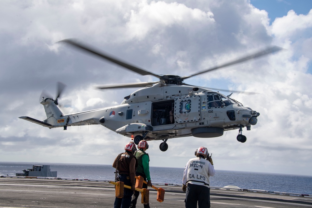 A Royal Netherlands Navy NH-90 NATO Frigate Helicopter Prepares to land on the Flight Deck of USS Carl Vinson (CVN 70) During RIMPAC 2024.