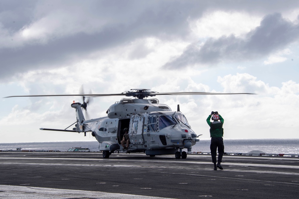 A Royal Netherlands Navy NH-90 NATO Frigate Helicopter Prepares to Take Off from the Flight Deck of USS Carl Vinson (CVN 70) During RIMPAC 2024