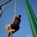 10th SFG(A) Soldier climbs rope