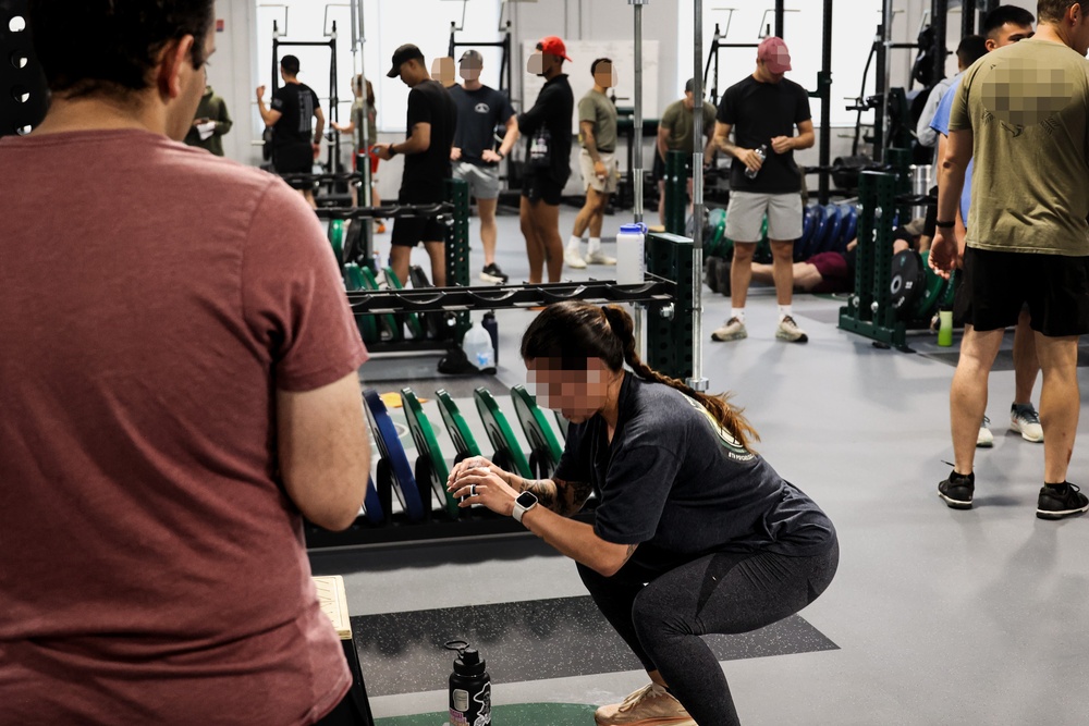 10th SFG(A) Soldier performs squats as part of &quot;The Murph&quot; challenge