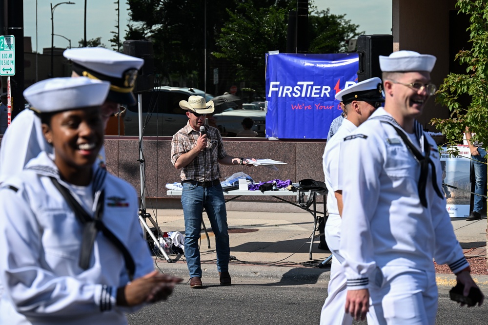 Wyoming National Guard members announce the parade as part of Cheyenne Frontier Days in Cheyenne, Wyoming, July 20, 2024. (U.S. Army National Guard photo by Joseph Coslett Jr.)