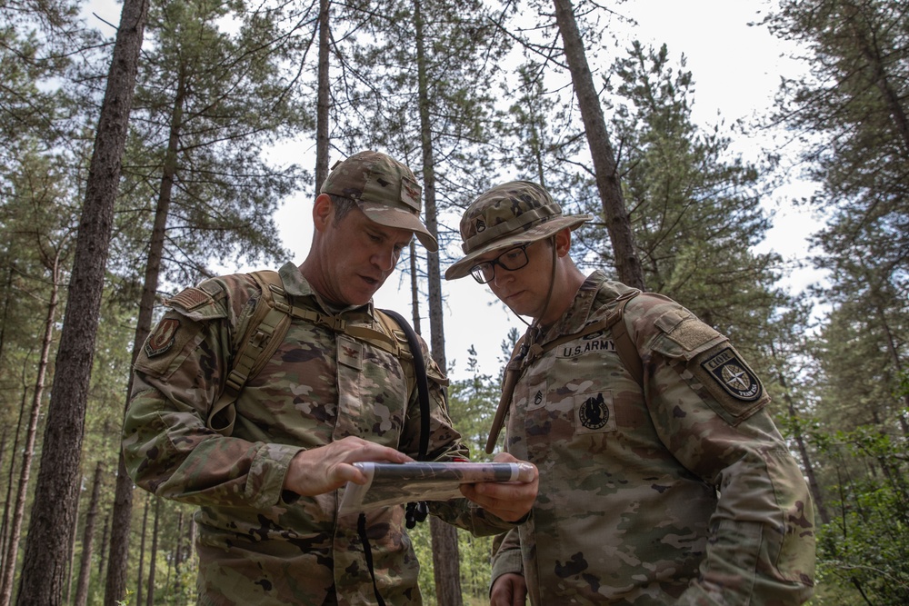 Col. Brent Dishman checks map with Staff Sgt. Zachary Mills