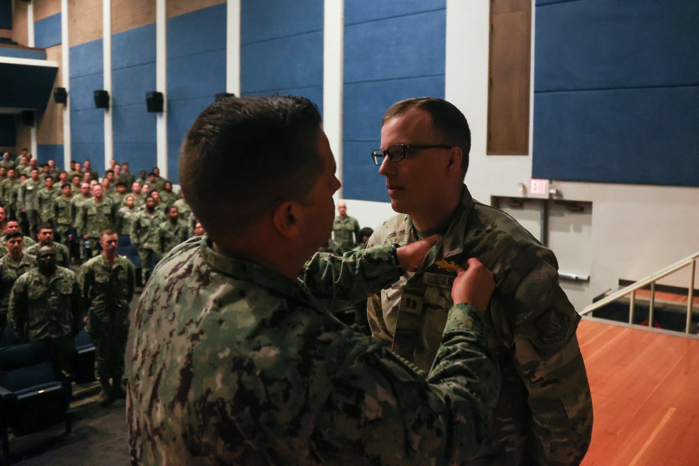 Airforce Captain is Awarded the Seabee Combat Warfare Specialist Pin