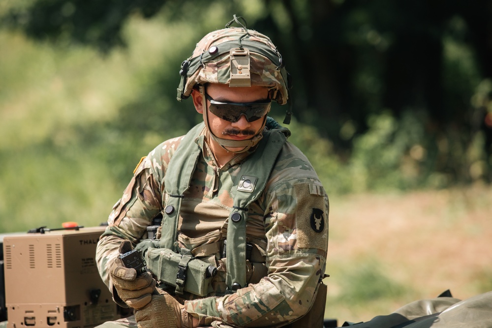 Iowa Army National Guard infantryman operates SMET vehicle