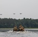 Black Hawks fly overhead as Iowa Soldiers navigate Mississippi River