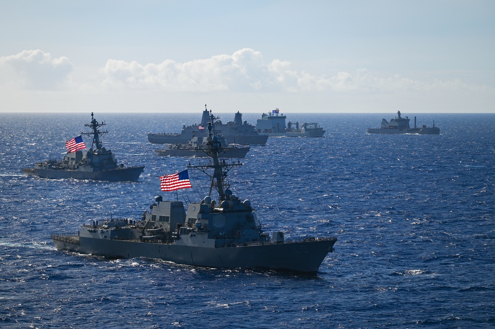 Multinational ships sail in formation during RIMPAC 2024