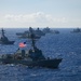 Multinational ships sail in formation during RIMPAC 2024