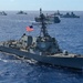 Multinational ships sail in formation during RIMPAC 2024