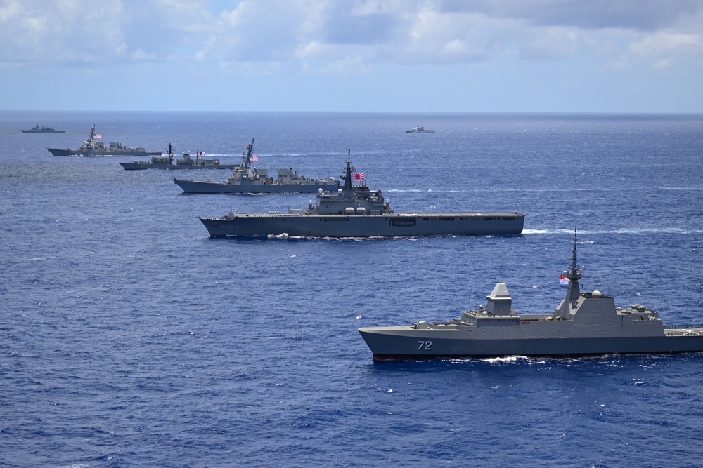 Multinational ships sail in formation during RIMPAC 2024