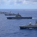 Multinational ships sail in formation during RIMPAC 2024