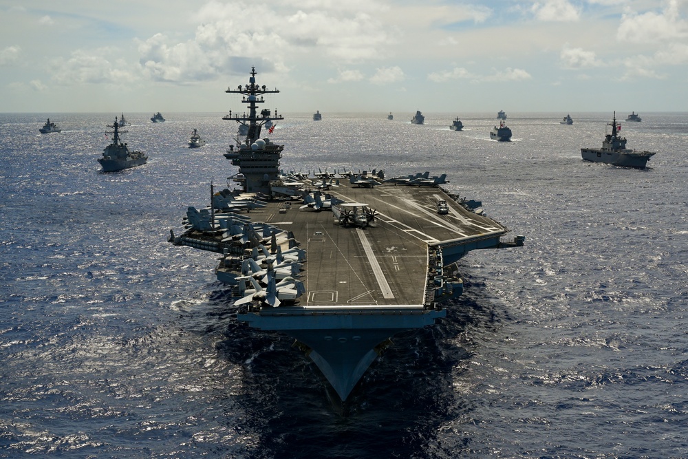 Multinational ships sail in formation during RIMPAC 2024