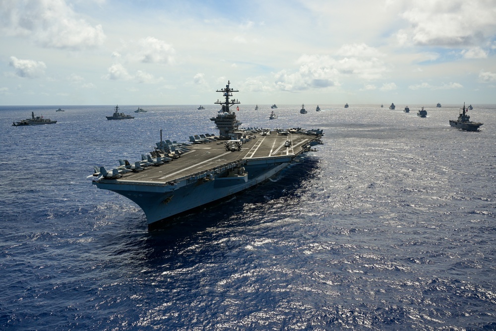 Multinational ships sail in formation during RIMPAC 2024