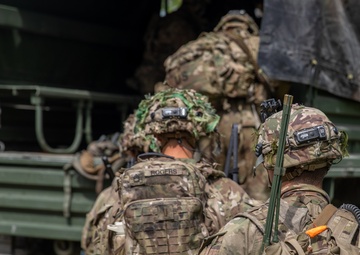 The Soldiers of Task Force Guardian load up to take objective 'SALT' while at JRTC 24-09