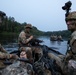 Iowa Soldiers navigate Zodiac boat down Mississippi River