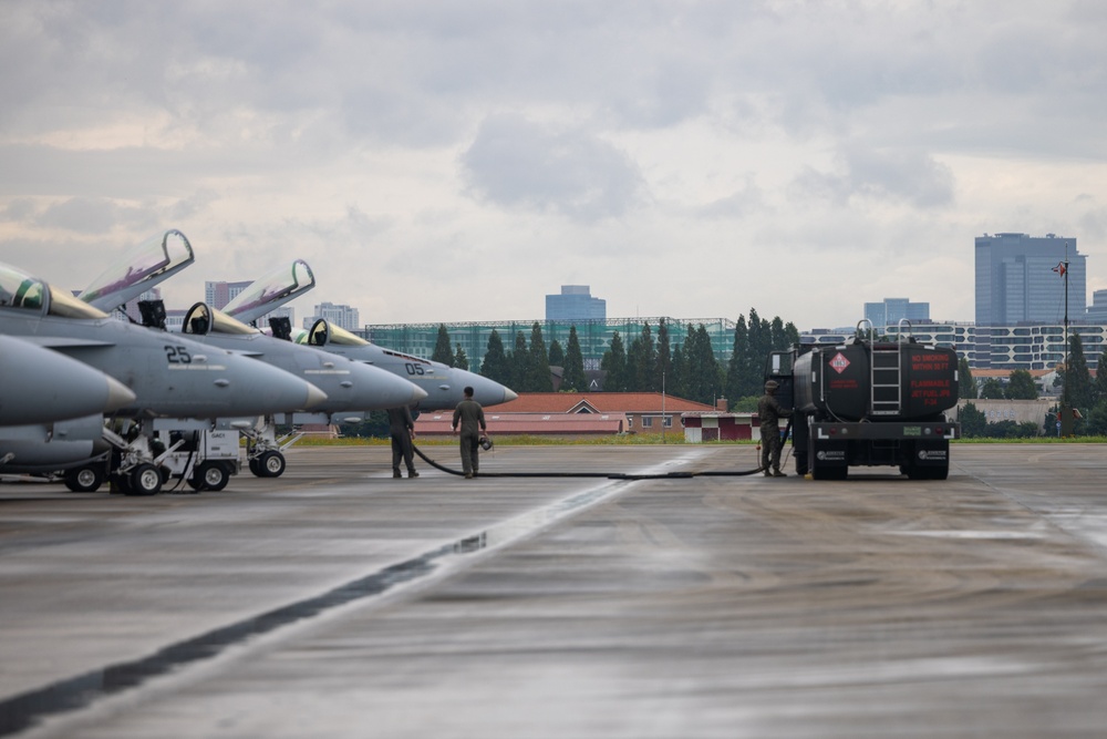 Refueling | Marines with Marine Wing Support 171 conduct refueling for F/A-18 Hornet Aircraft with Marine All-Weather Fighter Attack Squadron 224