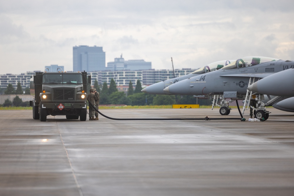 Refueling | Marines with Marine Wing Support 171 conduct refueling for F/A-18 Hornet Aircraft with Marine All-Weather Fighter Attack Squadron 224