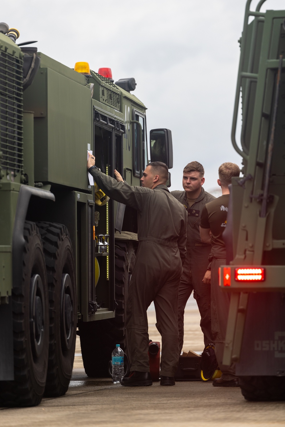 Refueling | Marines with Marine Wing Support 171 conduct refueling for F/A-18 Hornet Aircraft with Marine All-Weather Fighter Attack Squadron 224