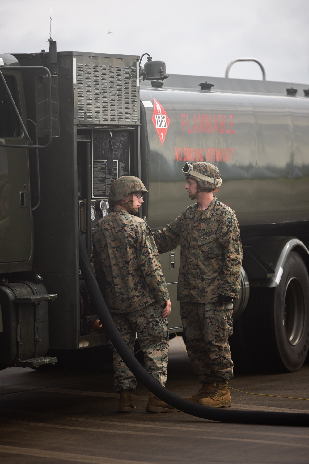 Refueling | Marines with Marine Wing Support 171 conduct refueling for F/A-18 Hornet Aircraft with Marine All-Weather Fighter Attack Squadron 224