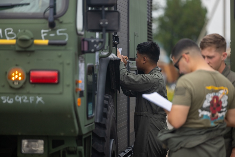 Refueling | Marines with Marine Wing Support 171 conduct refueling for F/A-18 Hornet Aircraft with Marine All-Weather Fighter Attack Squadron 224