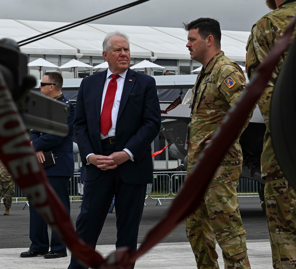 The Secretary of the Air Force greets military members at FIA 2024