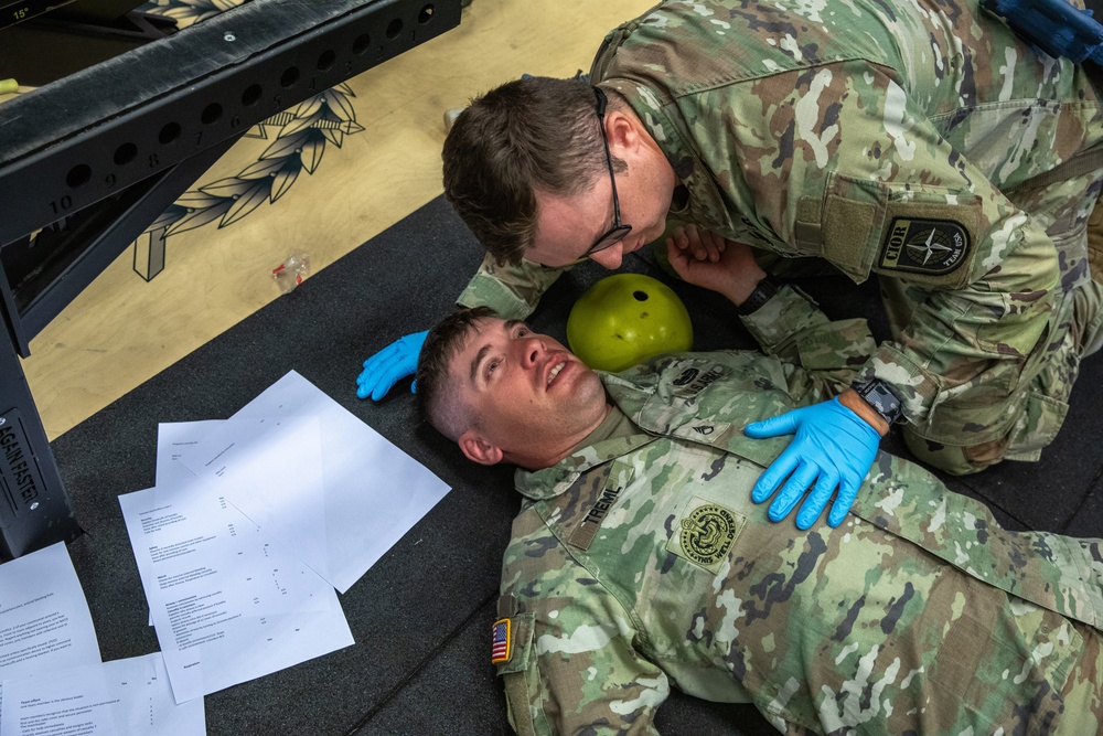 Staff Sgt. Zachary Mills conducts Tactical Combat Casualty Care