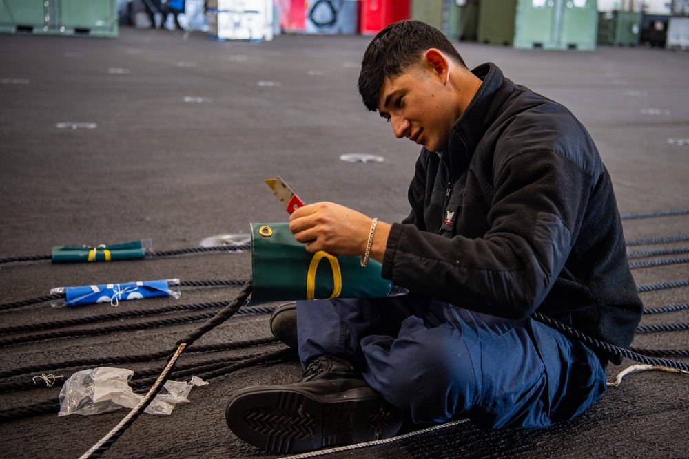 Nimitz Sailor Trims Replenishment Line