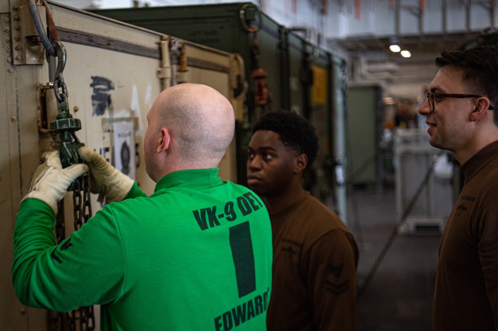 Nimitz Sailors Securing Aircraft Supplies