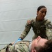 1st Lt. Jessica Romero applies a bandage to a casualty