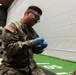 Sgt. 1st Class David Duran writes down casualty information