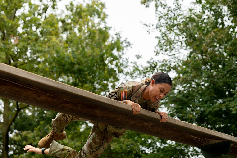 1st Lt. Jessica Romero jumps over an obstacle