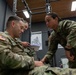 1st Lt. Brianna Mirmina talks with a casualty