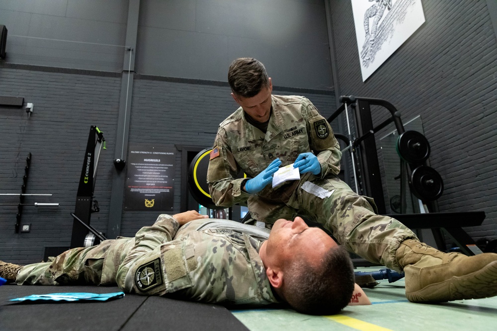 Staff Sgt. James performs practice combat casualty care