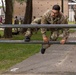 Sgt. 1st Class David Duran leaps over an obstacle