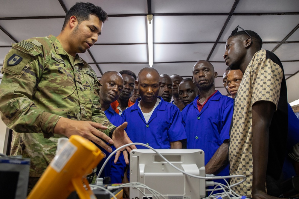 US Army biomedical equipment technician trains Burundian counterparts during medical exercise