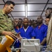 US Army biomedical equipment technician trains Burundian counterparts during medical exercise