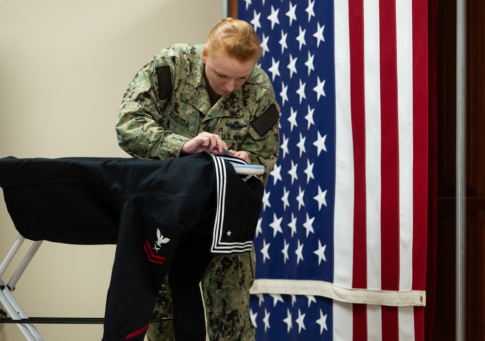 AFMAO Navy mortician prepares uniform