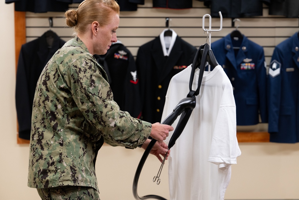 AFMAO Navy mortician prepares uniform