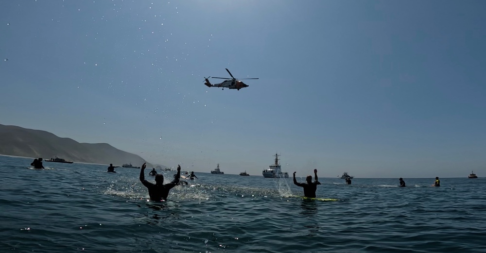 Community gathers for Paddle Out to honor and remember AST1 Phoenix Hanna