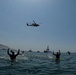Community gathers for Paddle Out to honor and remember AST1 Phoenix Hanna