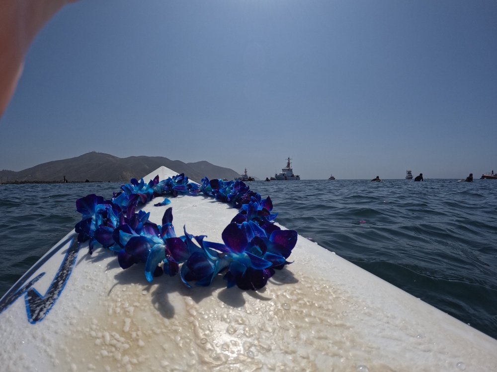 Community gathers for Paddle Out to honor and remember AST1 Phoenix Hanna